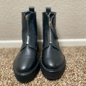 H&M Black ankle boots with front zipper. Never worn